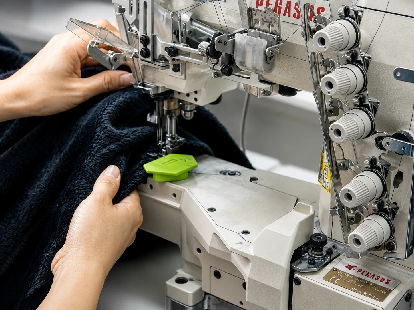 Sewing detail on dark fabric